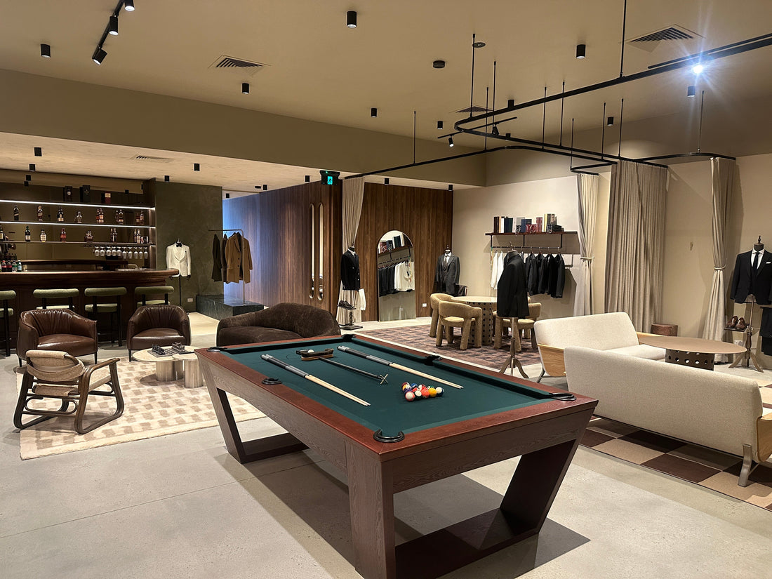 Melbournes best suiting showroom with a pool table, bar, lounge and private fitting rooms